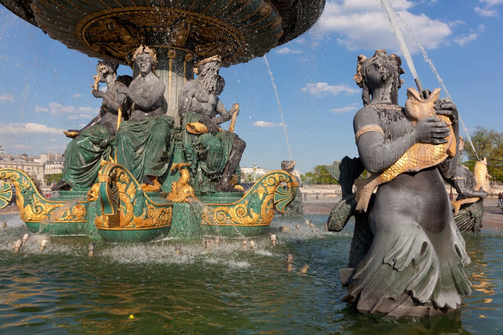 Ornate fountain with sculpted figures.