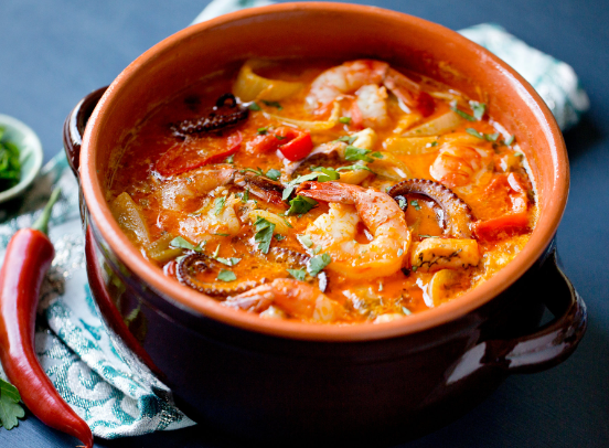 Spicy seafood stew in a bowl.