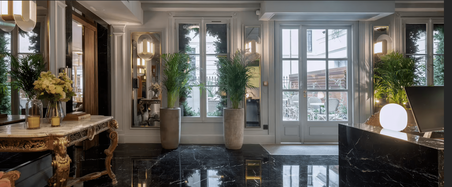 Elegant lobby with black marble floor.