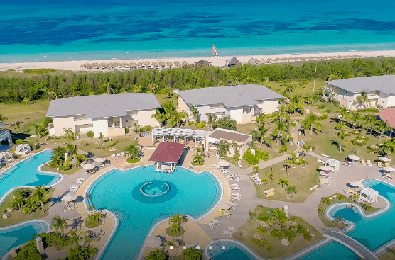 Aerial view of a resort with pools