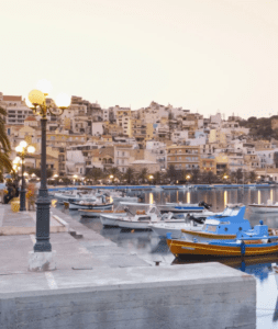 A number of boats docked in a harbor.