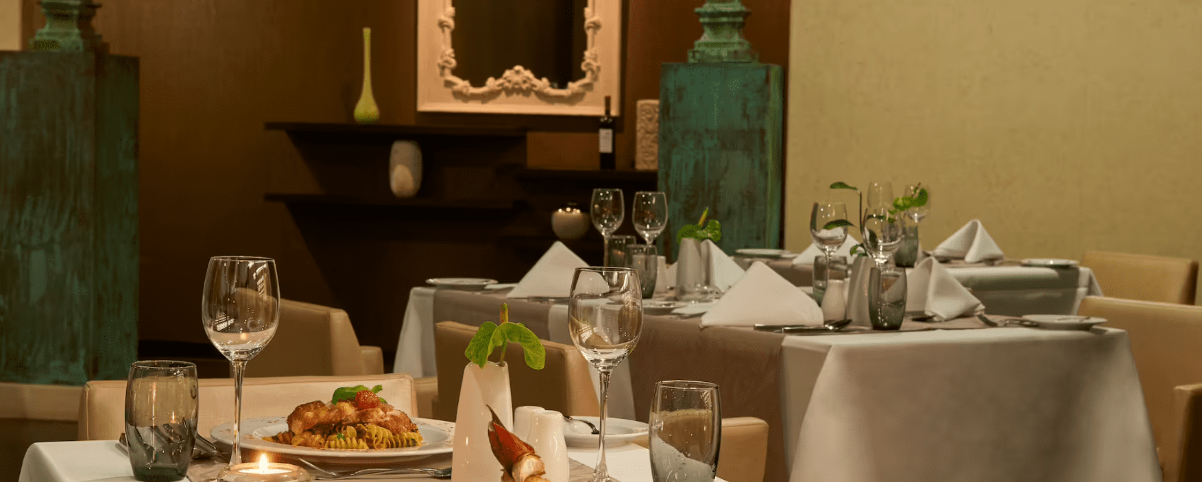 A restaurant is set up with a table and chairs.