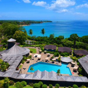 An aerial view of a resort with a swimming pool.