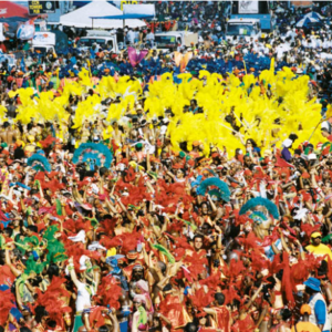 A crowd of people in red and yellow costumes.