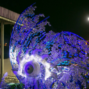 A float with a large blue fish on it.