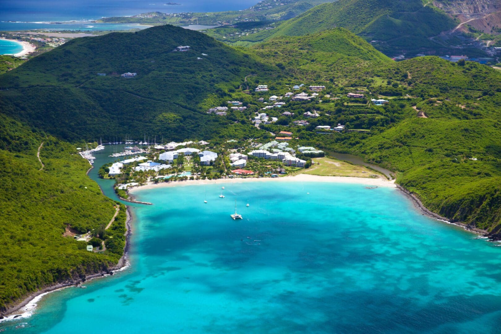 Aerial view of a tropical island beach.