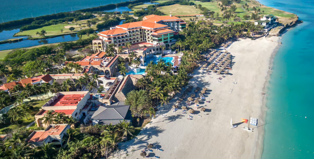 Aerial view of a resort with a beach.