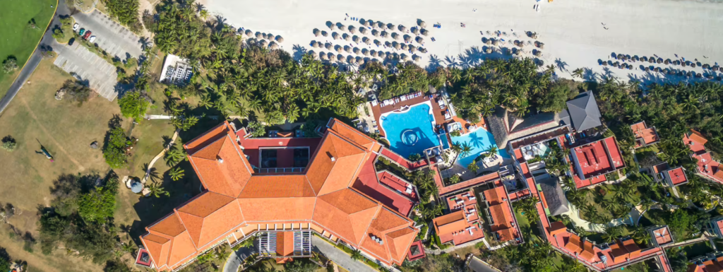 Aerial view of a resort with pools.