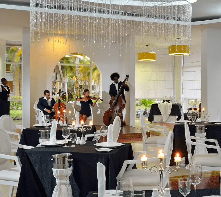 Elegant restaurant with live music and candles.