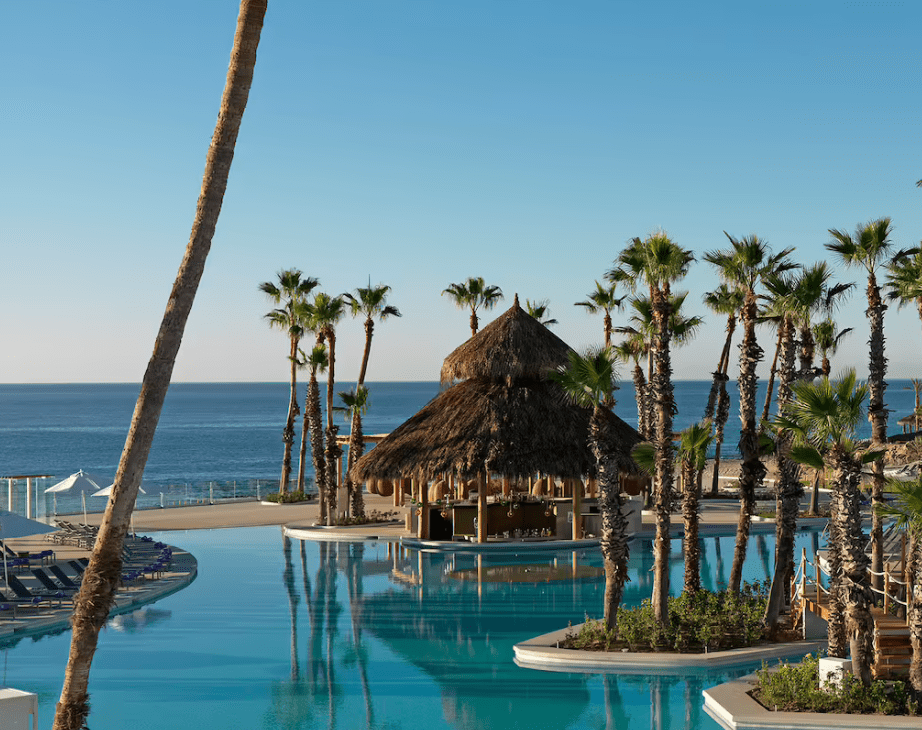 Beachfront resort pool with a bar.