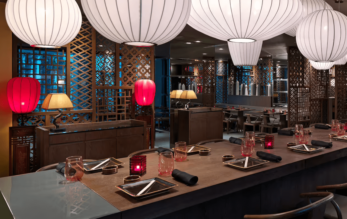 Restaurant table setting with red accents.