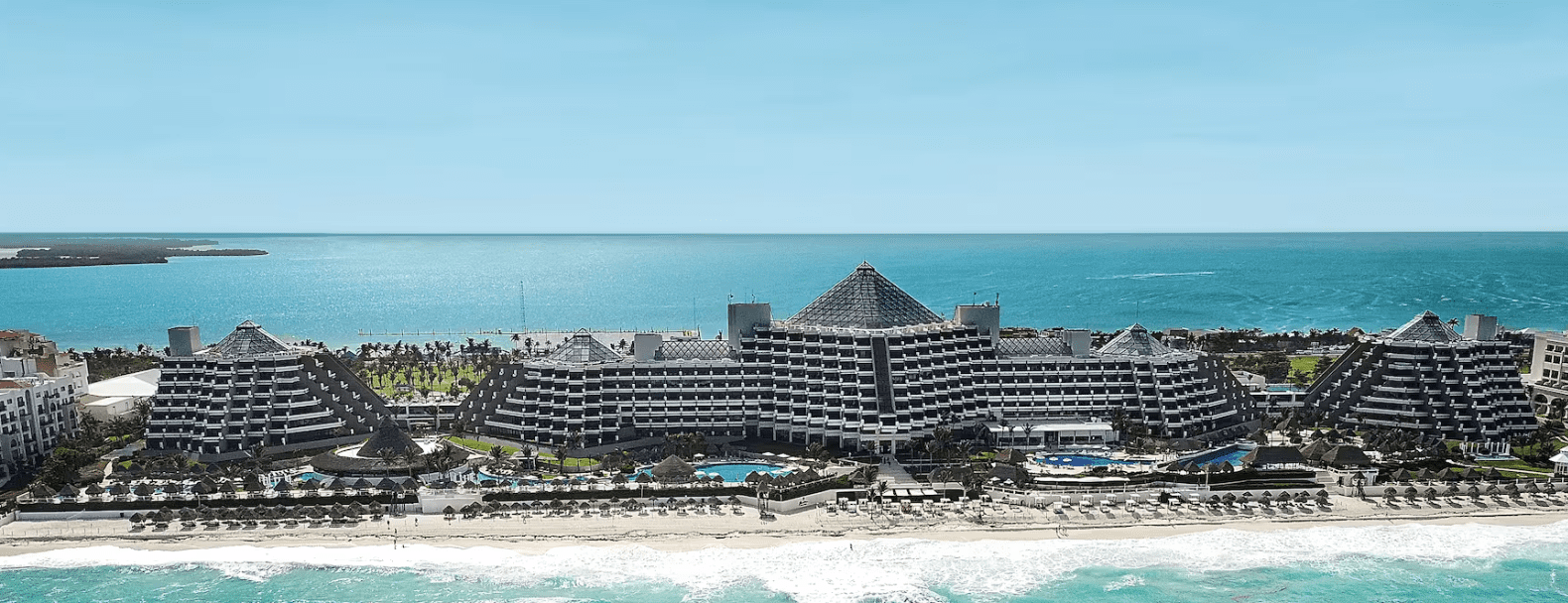 Aerial view of a resort on a beach.