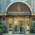 Four Seasons Hotel entrance with plants.