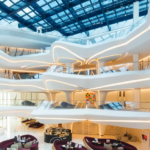 Modern building interior with curved balconies.