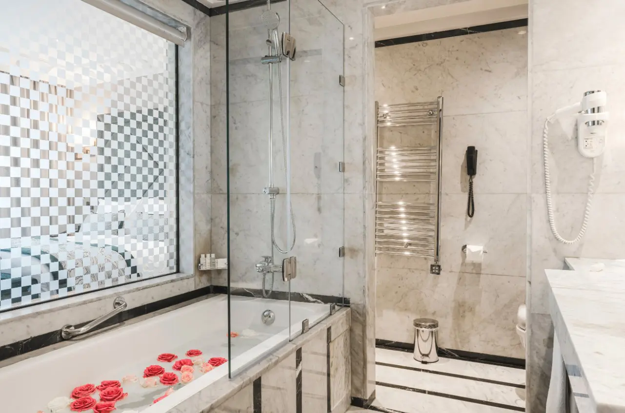 Luxury bathroom with bathtub and shower.