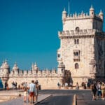 Lisbon, Portugal- Aug 18, 2023: Tourists visiting the historic Belém Tower in Lisbon, Portugal