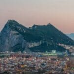 Gibraltar Rock overlooking a coastal city.