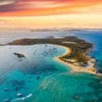 Aerial view of a tropical coastal landscape.