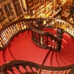 Elegant spiral staircase in a cozy library.