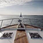 Boat bow view over tranquil water.