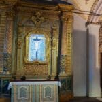 Ornate altar with crucifix and decorations