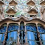 Colorful architectural facade with unique windows.