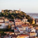 View of Lisbon with castle on hill.