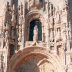 Ornate stone carvings on historical building faade.